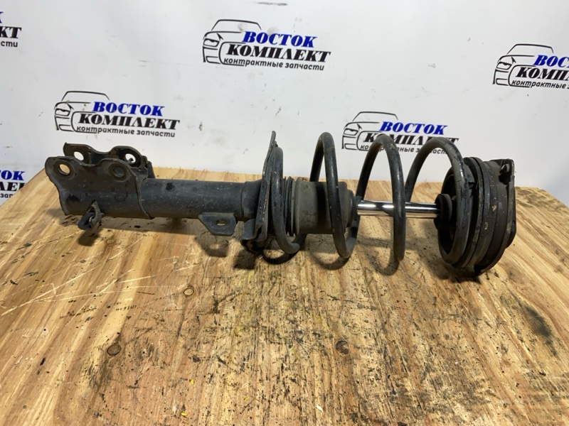 Стойка подвески Nissan Lafesta B30 MR20DE перед лев