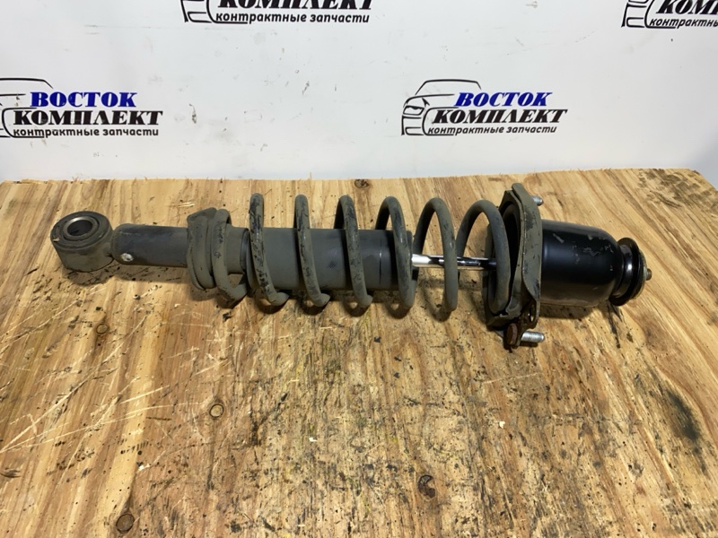 Стойка подвески Toyota Sienta 2003 NCP81G 1NZ-FE зад лев