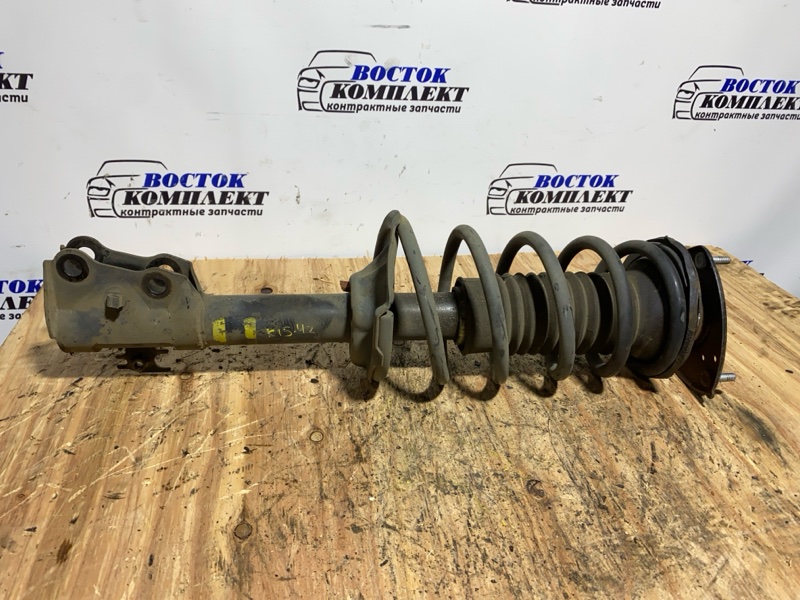 Стойка подвески Toyota Sienta 2003 NCP81G 1NZ-FE перед лев