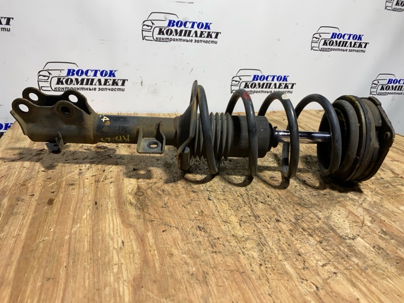 Стойка подвески Nissan AD VY12 HR15DE перед лев