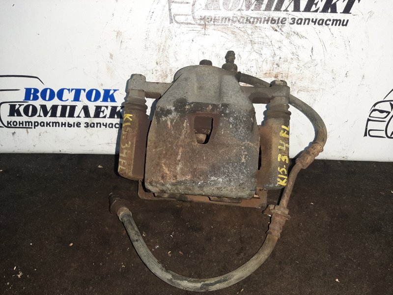 Суппорт Toyota Ractis 2008 NCP105 1NZ-FE перед лев