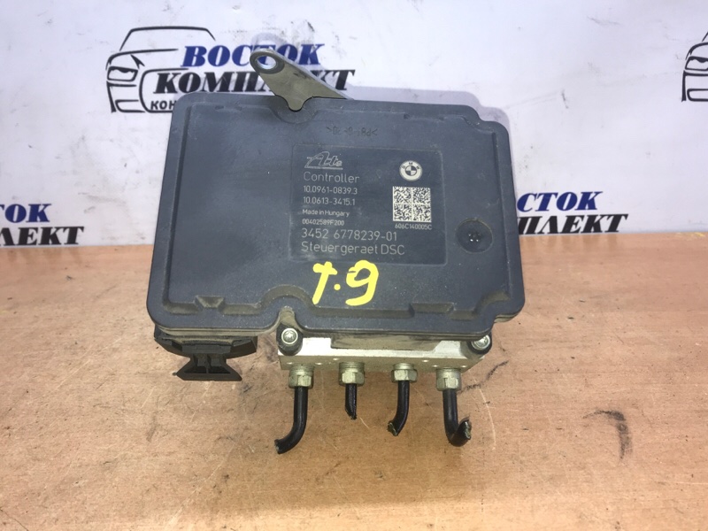 Блок управления ABS BMW 323i WBAVB56040NK85502 N52B25