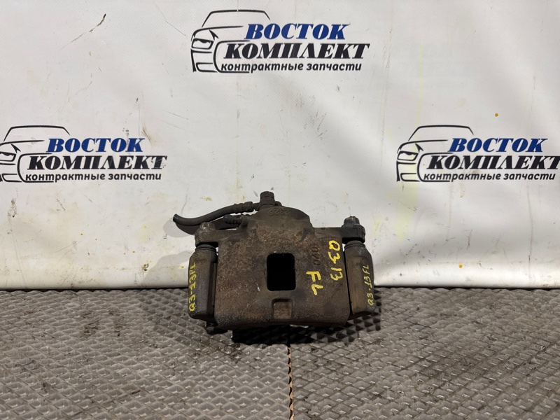 Суппорт Isuzu Bighorn 2000 UBS73GW 4JX1 перед лев