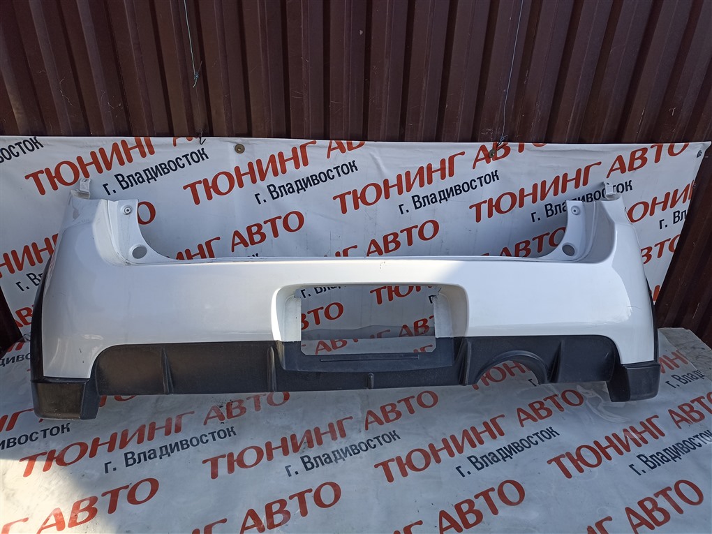 Бампер Mitsubishi Colt Z27AG 4G15T 2009 задний белый w13 1533