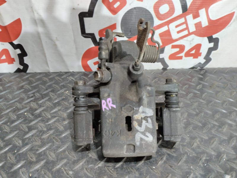 Суппорт тормозной задний правый CEFIRO A32 VQ20DE