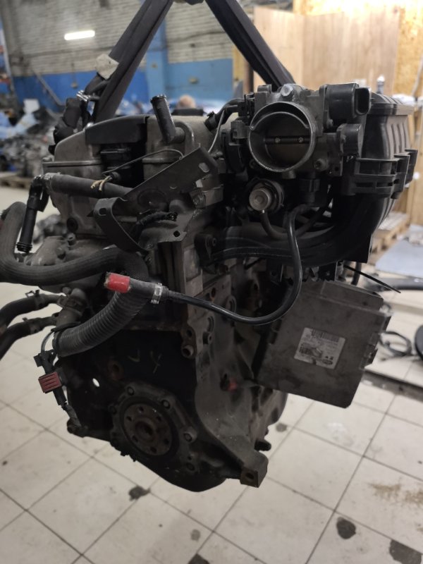 Двигатель 106 1A TU5J4
