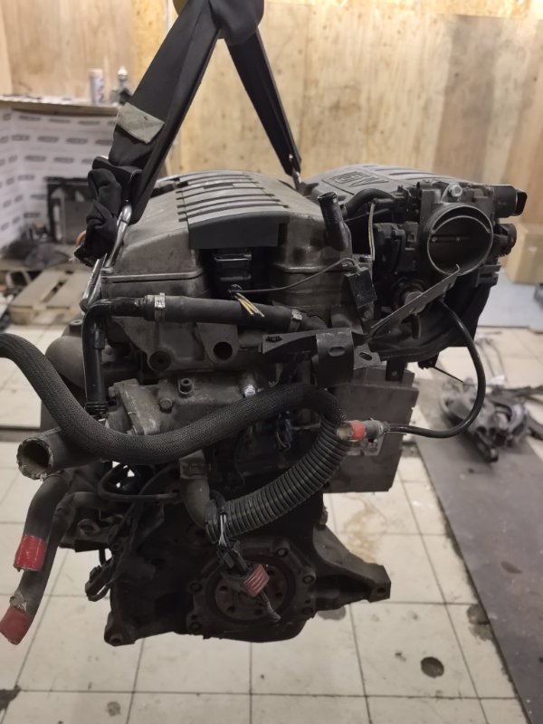 Двигатель 106 1A TU5J4