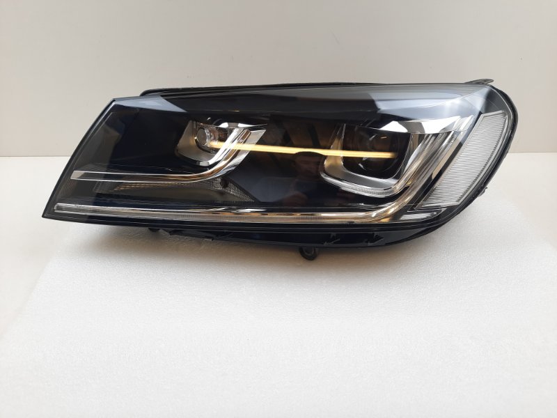 Фара Volkswagen Touareg (NF) левая