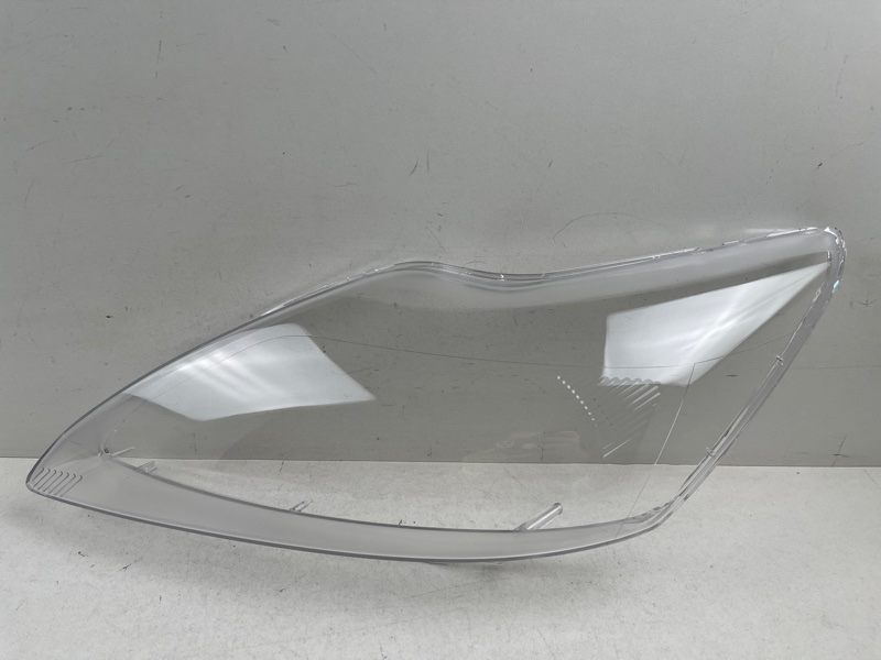 Стекло фары Ford Focus (2) левая