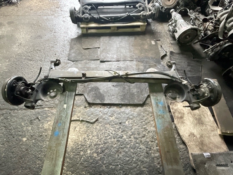 Балка подвески Toyota Platz SCP11 1SZFE 1999 задняя (б/у)