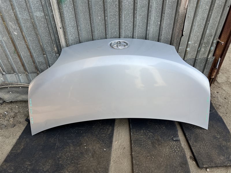 Капот Toyota Porte NNP11 передний COLOR 1E7