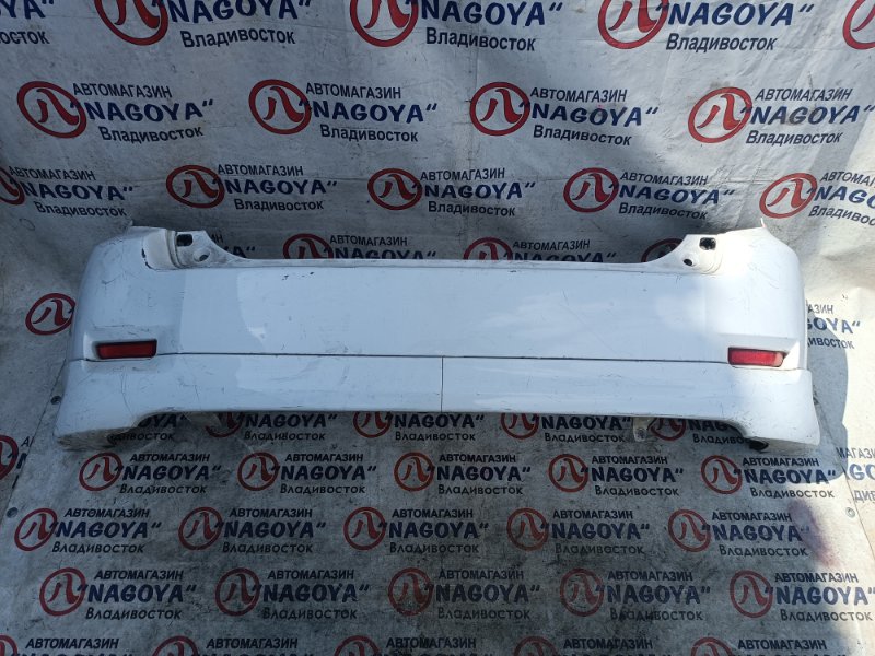 Бампер Toyota Corolla Rumion ZRE152 задний COLOR 040