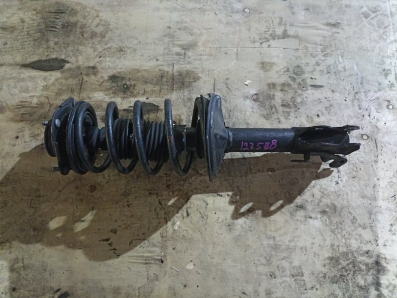 Стойка TOYOTA RAUM EXZ10 5E-FE передняя левая (б/у)