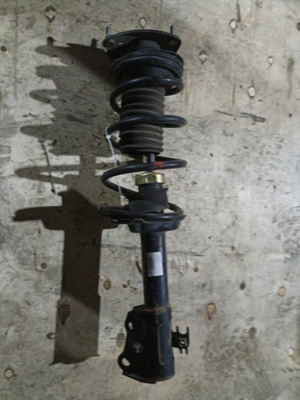 Стойка TOYOTA PROBOX NCP51 1NZ-FE передняя левая (б/у)