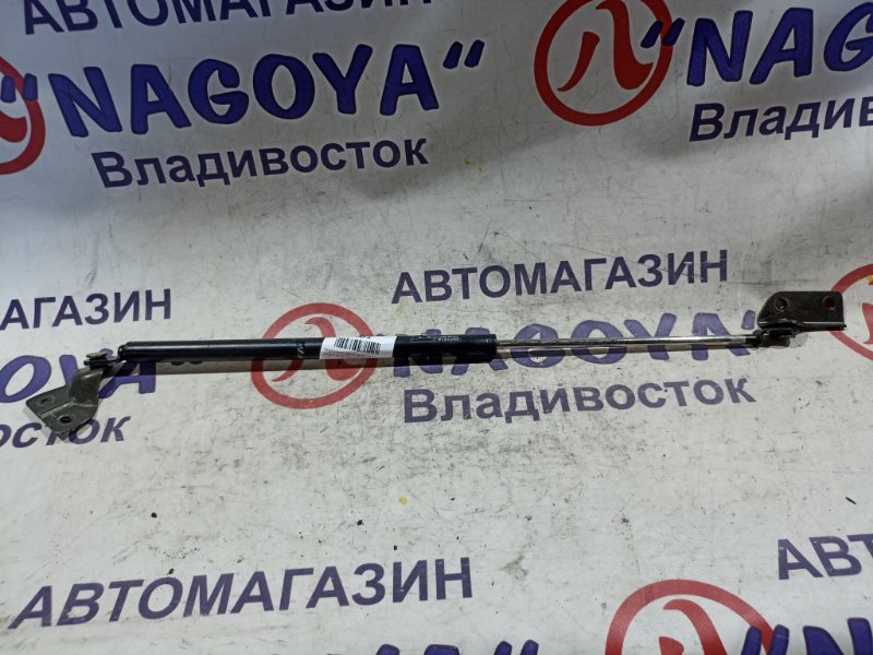 Амортизатор задней двери SUZUKI AERIO RB21S M15A задний (б/у)
