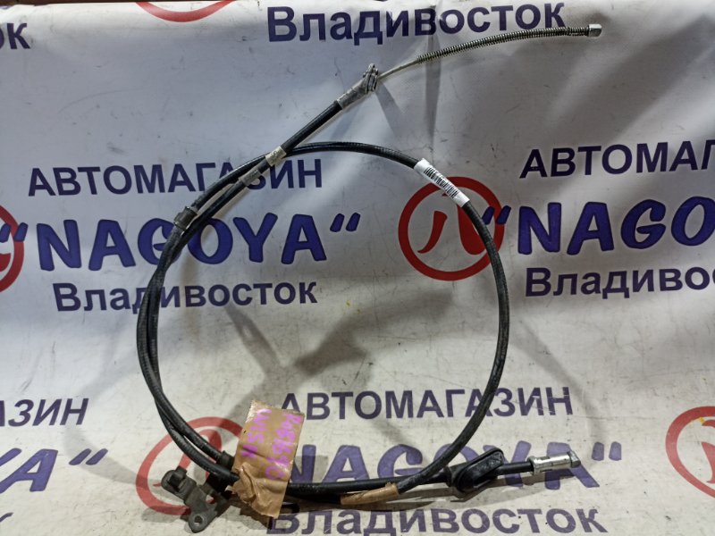 Тросик ручного тормоза TOYOTA WISH ZNE10 1ZZ-FE задний левый (б/у)
