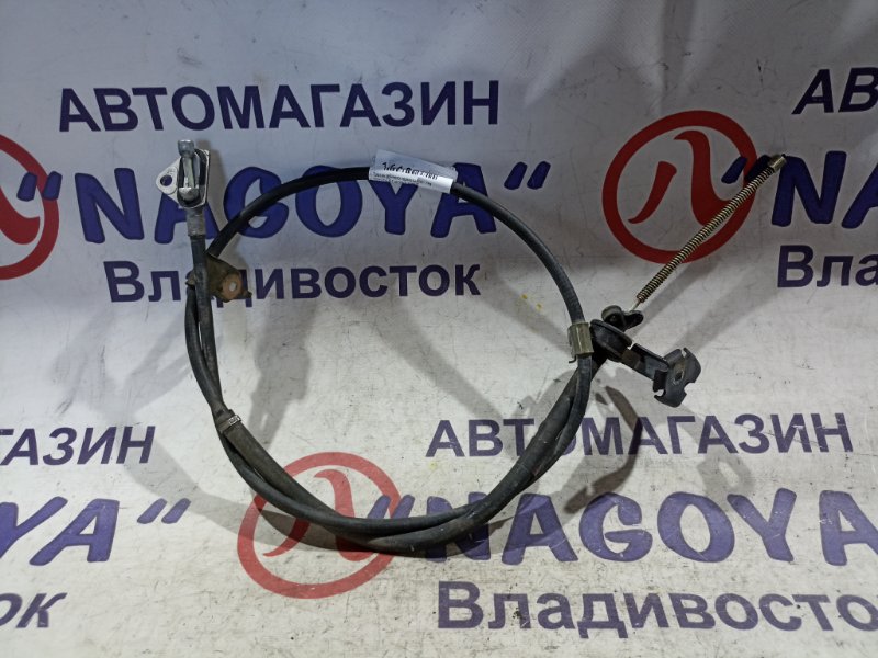 Тросик ручного тормоза TOYOTA IST NCP65 1NZ-FE задний левый (б/у)