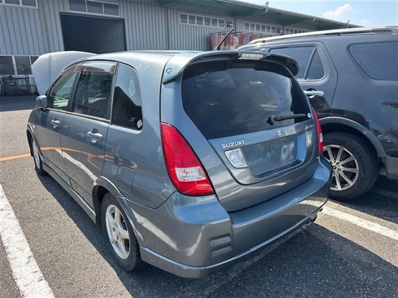 Спойлер SUZUKI AERIO RD51S M18A задний COLOR ZY4 (б/у)