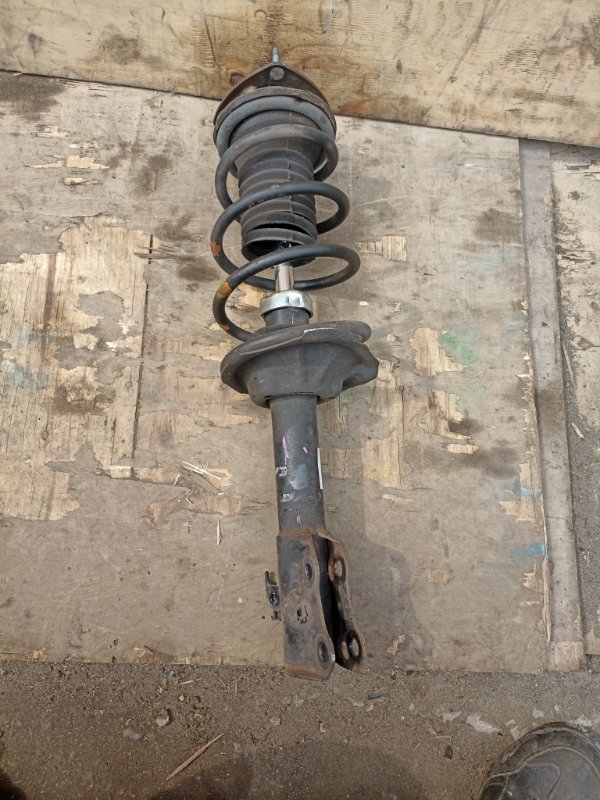 Стойка TOYOTA PORTE NNP11 1NZ-FE передняя левая (б/у)
