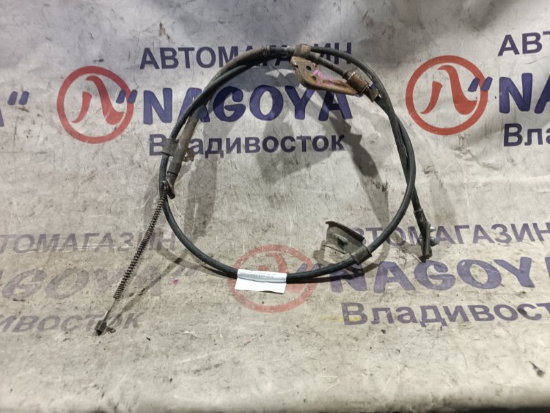 Тросик ручного тормоза TOYOTA PROBOX NCP59 1NZ-FE задний левый (б/у)