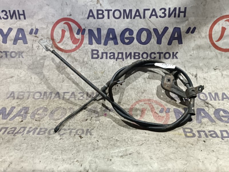 Тросик ручного тормоза TOYOTA SUCCEED NCP51 1NZ-FE задний левый (б/у)