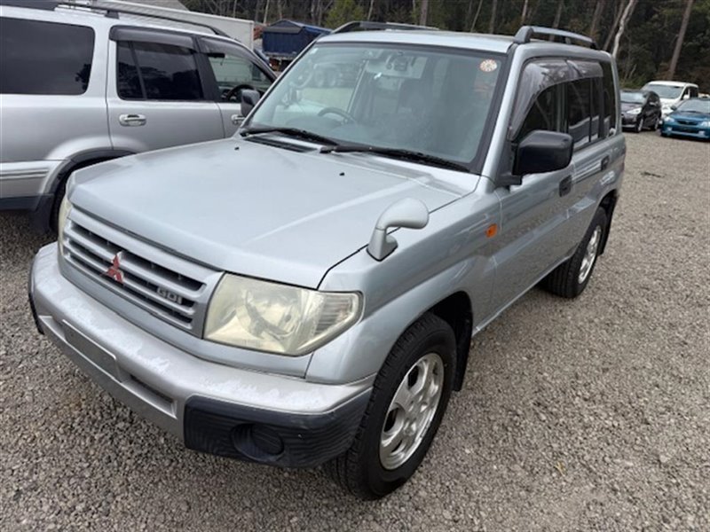 Планка под фары MITSUBISHI PAJERO IO H76W 4G93 передняя COLOR A71 (б/у)