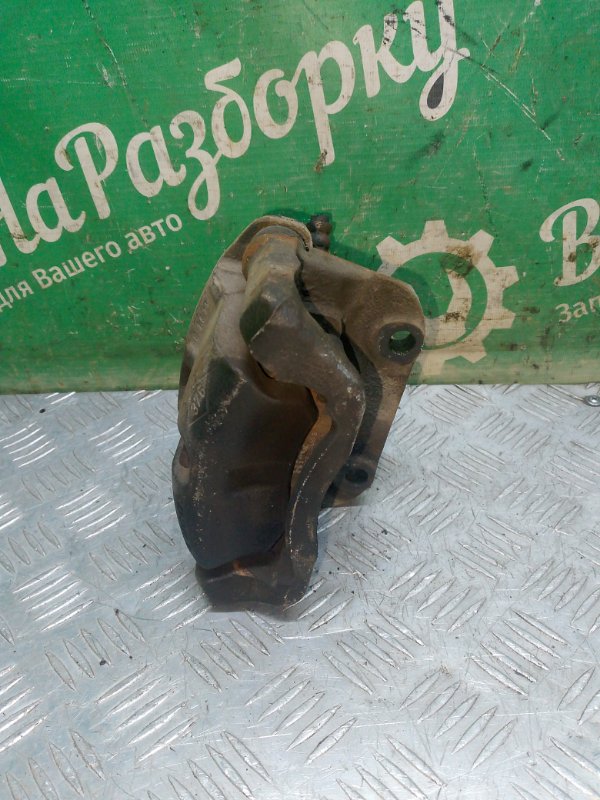 Суппорт передний левый Logan 1