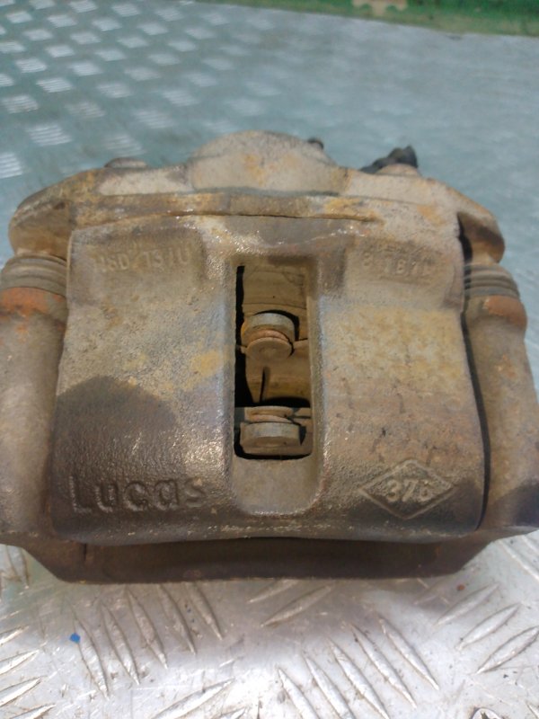 Суппорт передний левый Logan 1