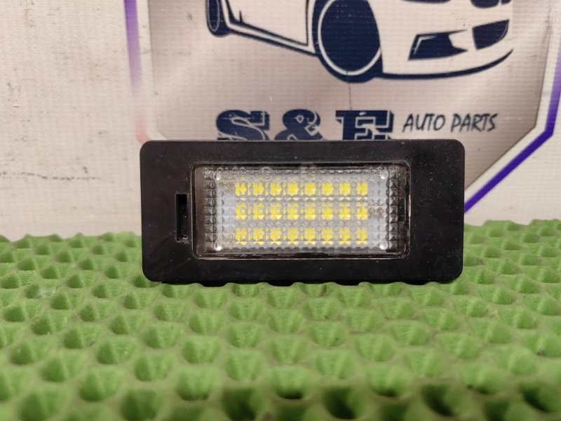 Подсветка номера BMW 2014 F32 N20B20B 63267193293 Б/У