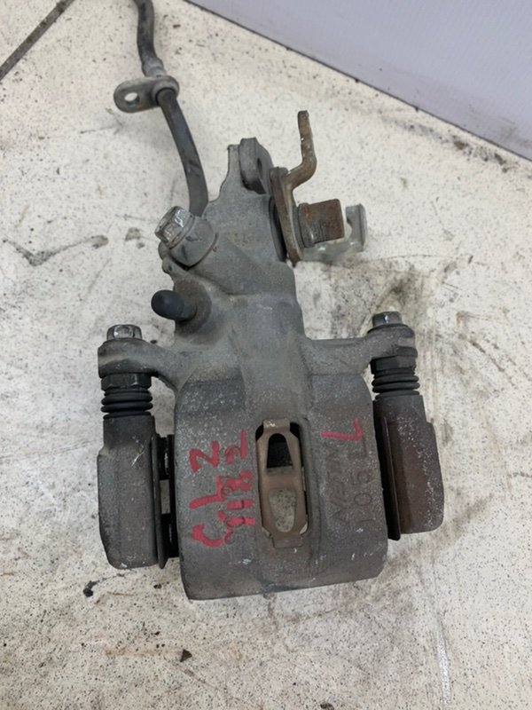 Суппорт тормозной задний левый Accord 2000 CL2 H23A