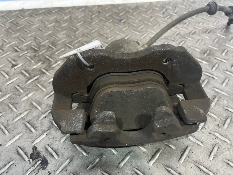 Суппорт тормозной передний правый Ford Focus 2