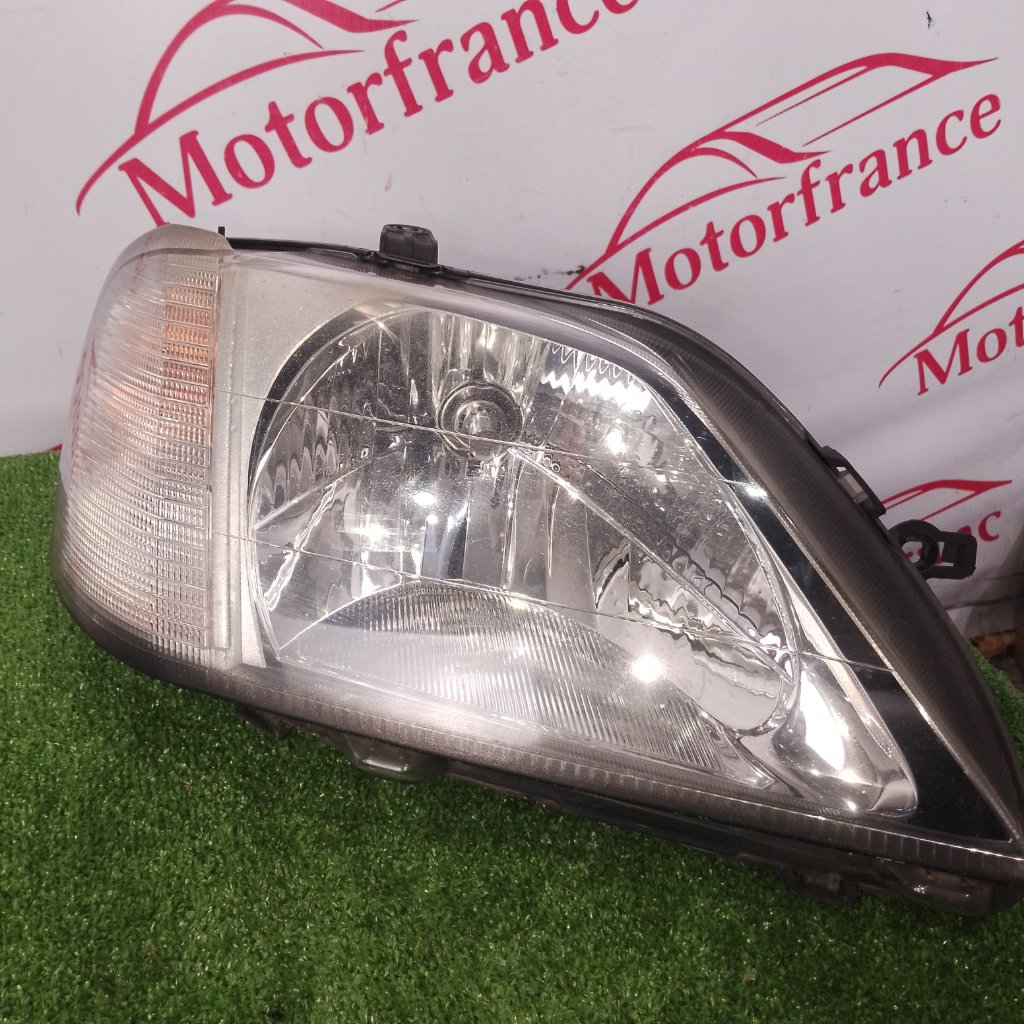 Фара галогеновая передняя правая Logan 2007 1 Фара галогеновая передняя правая Logan 2007 1