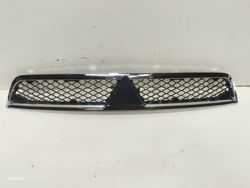 Решетка радиатора передняя Mitsubishi Lancer 2007-2015 10 7450A492 новая