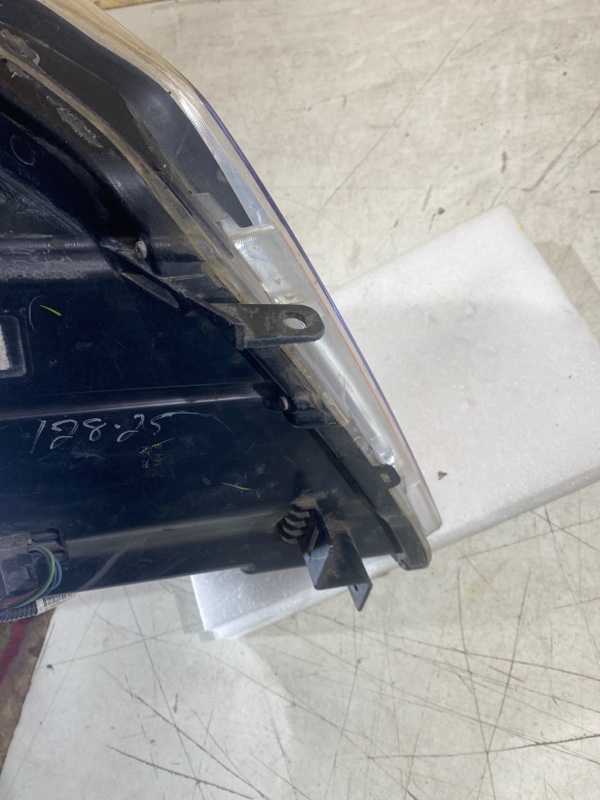 Фара галогеновая левая SRX 2012 2