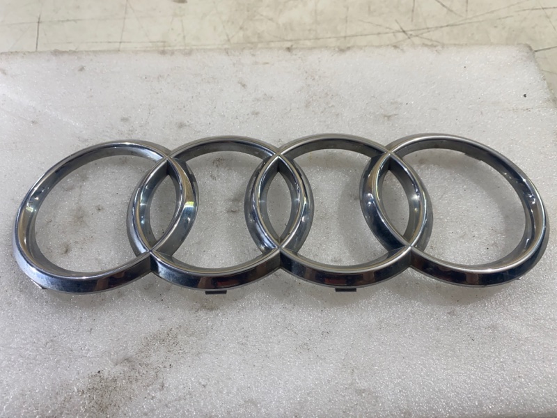 Эмблема Audi Q3 581310080 Б/У