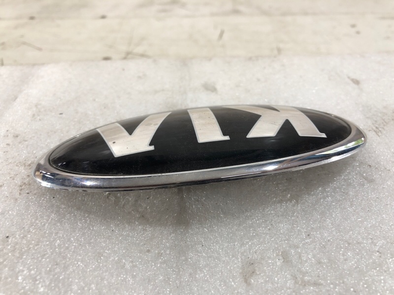 Эмблема передняя Kia Rio 4