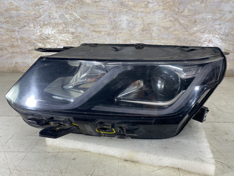 Фара галогеновая левая Geely Coolray SX11 6600003283 Б/У