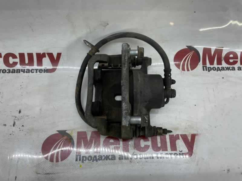 Суппорт передний левый IST 2000-2014 NCP65 1NZFE