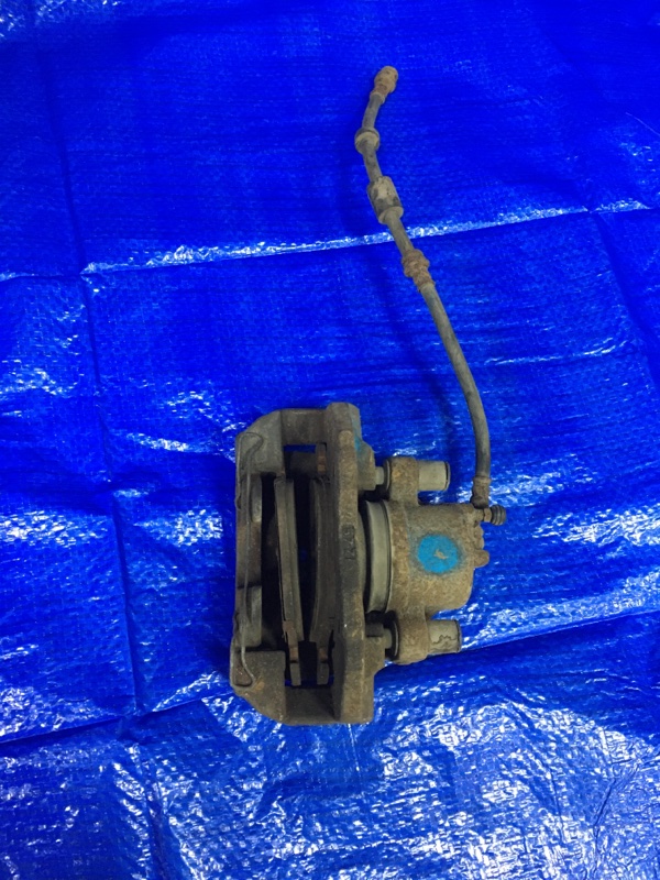 Суппорт тормозной передний левый Axela BK5P