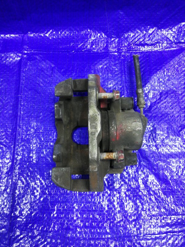 Суппорт тормозной передний левый Demio DY3W Суппорт тормозной передний левый Demio DY3W