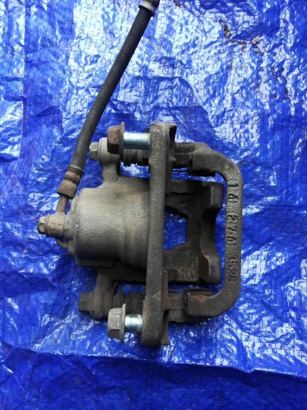 Суппорт тормозной задний левый Juke 2012 F15 MR16DDT