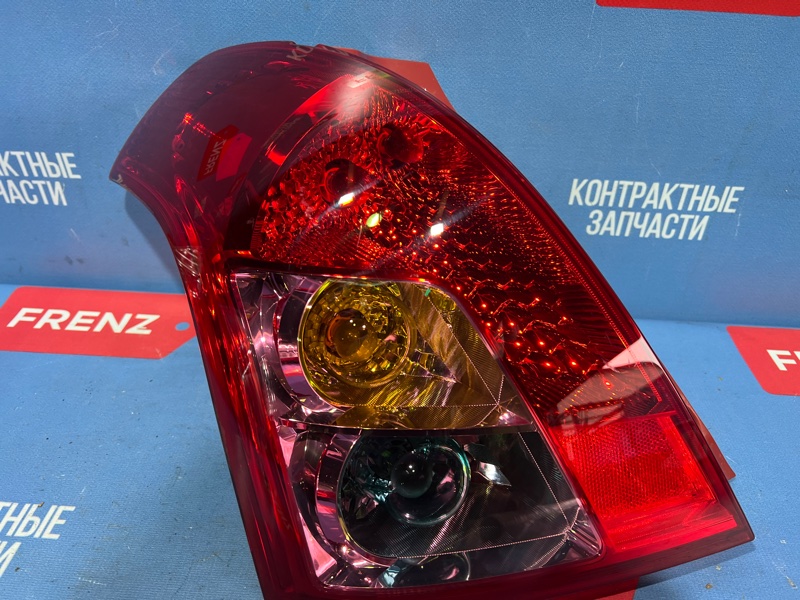 Фонарь левый Suzuki Swift ZC11