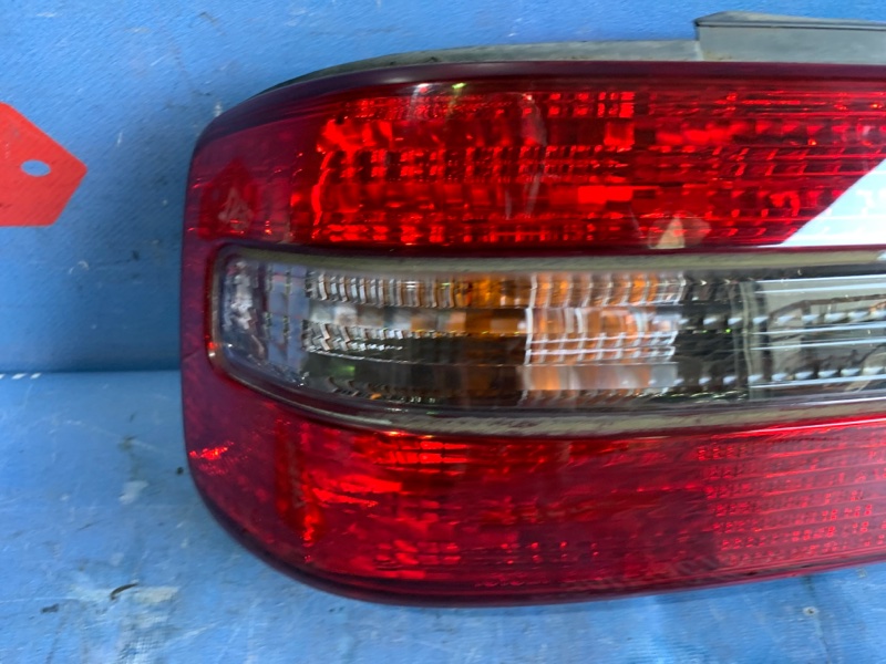 Фонарь левый Toyota Chaser GX100
