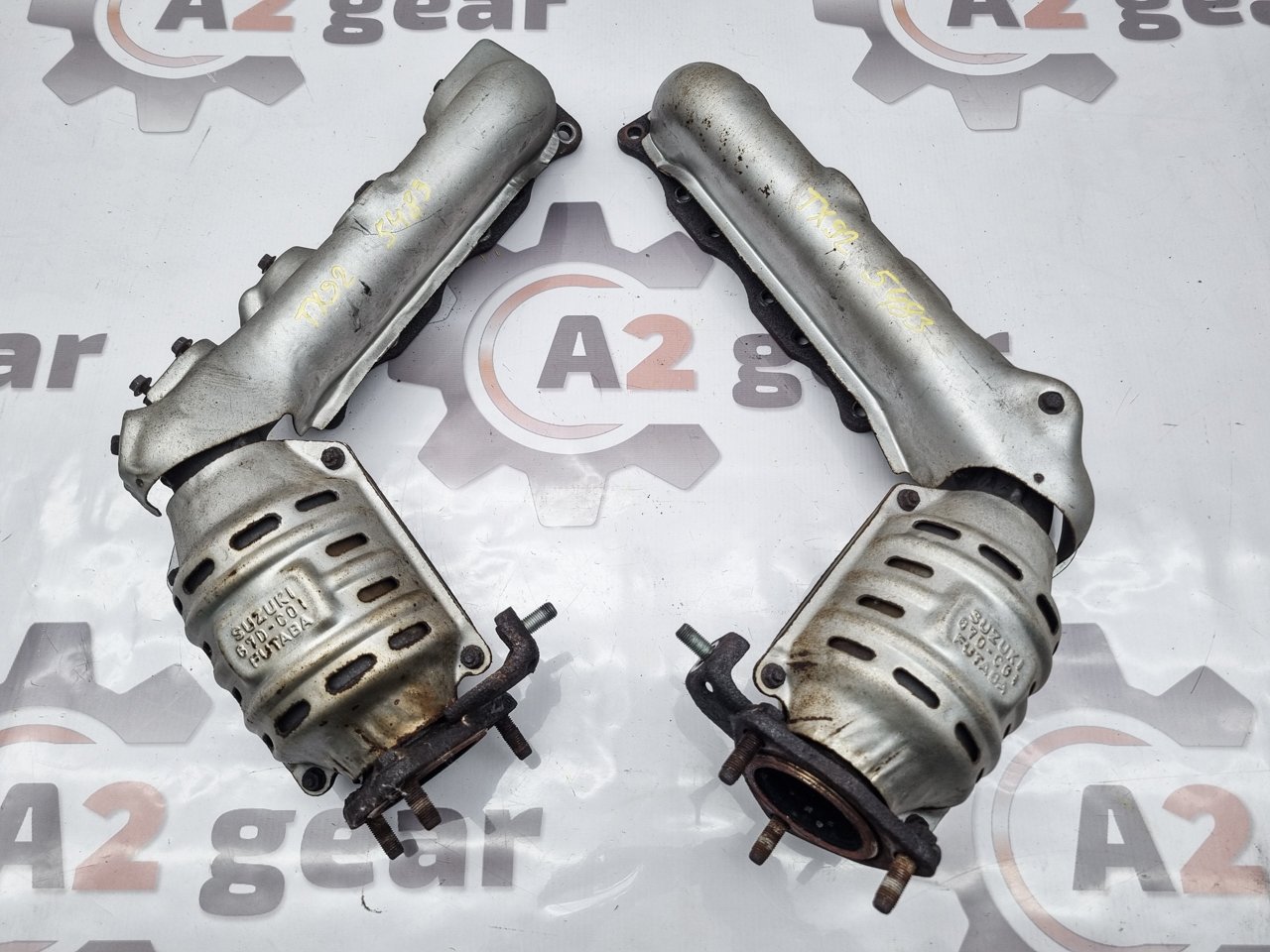 Запчасть коллектор выпускной Suzuki Grand Escudo 2002 TX92W H27A 14110-67D03 контрактная Коллектор выпускной Suzuki Grand Escudo 2002 TX92W H27A 14110-67D03 контрактная