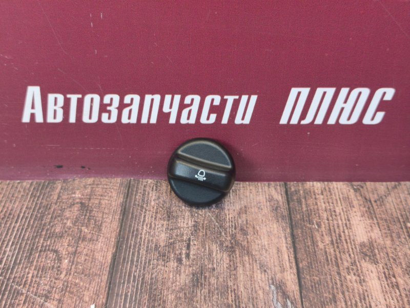 Кнопка корректора фар