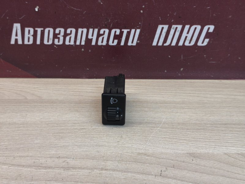 Кнопка корректора фар