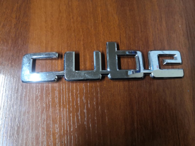Эмблема Nissan Cube BZ11 CR14DE 10.2002