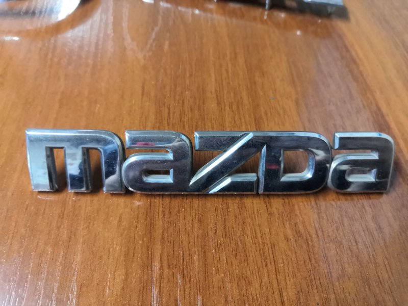 Эмблема Mazda Axela BK5P ZY-VE