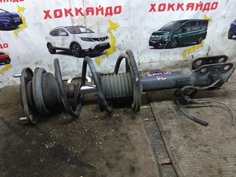 Стойка подвески Toyota Isis ZNM10G 1ZZ-FE 09.2004 передняя левая