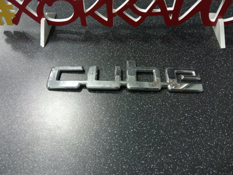 Эмблема Nissan Cube BZ11 CR14DE 10.2002 задняя
